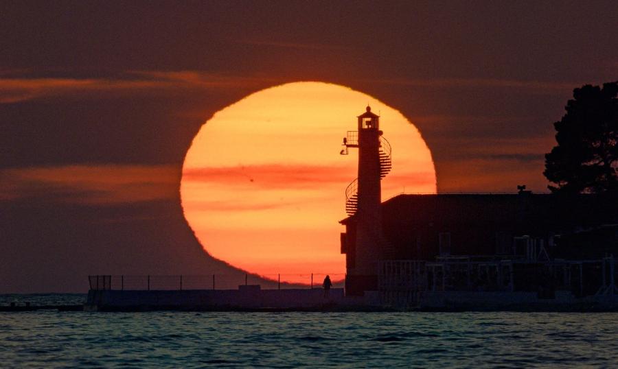 Romantic sunset view from Puntamika Lighthouse in Zadar